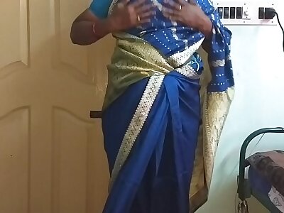 des indian horny cheating tamil telugu kannada malayalam hindi wife vanitha wearing blue diagonal saree  showing big boobs and shaved pussy press steadfast boobs press chew rubbing pussy masturbation